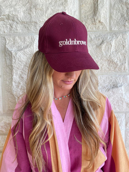 goldnbrown cap burgundy