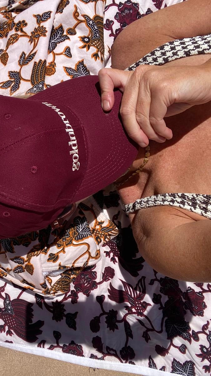 goldnbrown cap burgundy