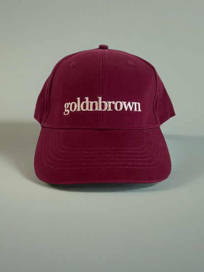goldnbrown cap burgundy